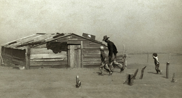 Farmer and his sons and their farm house during a dust storm