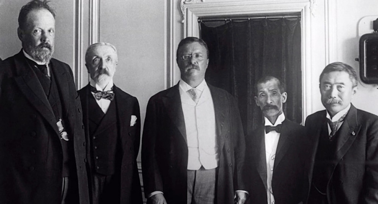 Theodore Roosevelt with a group of people after winning the Nobel Peace Prize