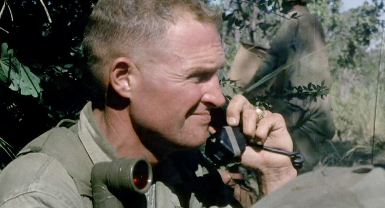 Lt. Col. Hal Moore on a radio in the battlefield.