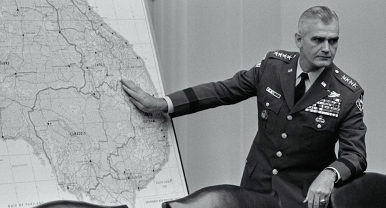 General Westmoreland points to a map.